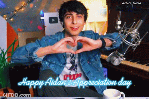 Young Man Making Heart With Hands GIF
