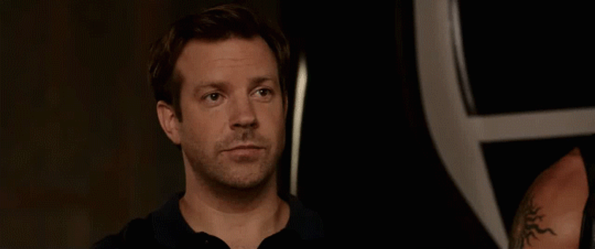 Young Man Making Meh Face GIF