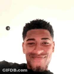 Young Man Making Peace Sign GIF