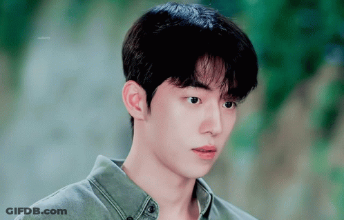 Young Man On Green Background Saying Eternity GIF