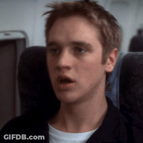 Young Man On Plane With United Airlines Shirt GIF