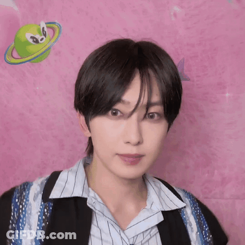 Young Man Pink Wall Green Planet GIF