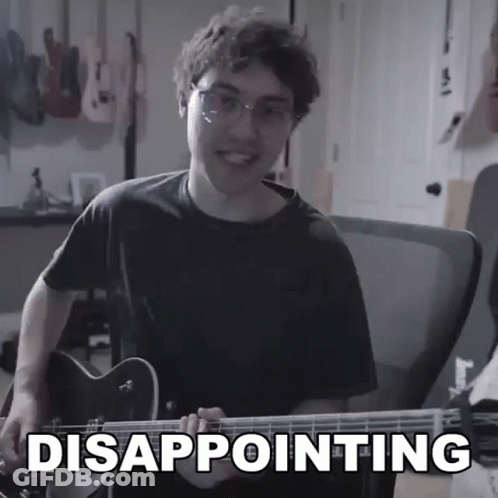 Young Man Playing Guitar With Disappointing GIF