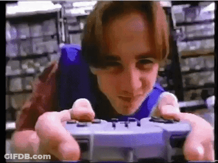 Young Man Playing Video Game Controller GIF