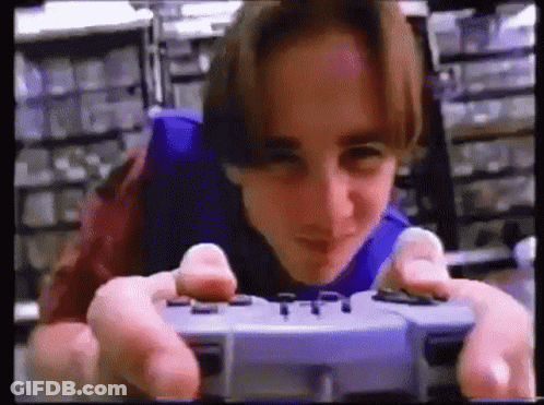 Young Man Playing Video Game GIF