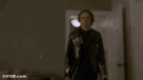 Young Man Pointing Gun GIF