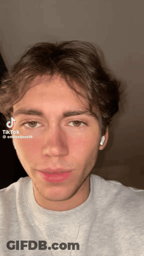 Young Man's Face With TikTok Sticker GIF