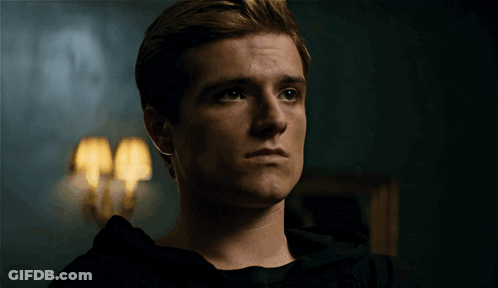Young Man's Serious Face Close Up GIF
