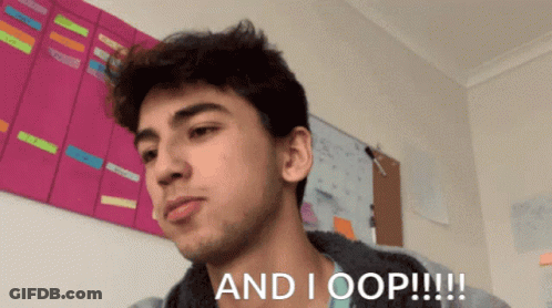 Young Man Saying And I Oop !!! In Pink Board GIF