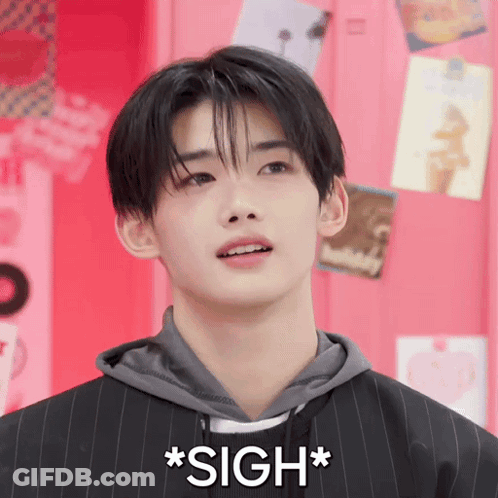 Young Man Sigh Face Close Up GIF