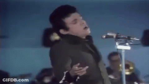 Young Man Singing Into Microphone GIF