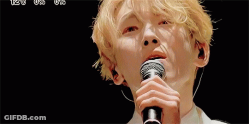 Young Man Singing Into Microphone GIF