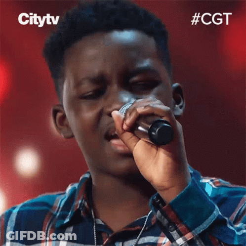 Young Man Singing Into Microphone GIF
