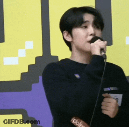 Young Man Singing Into Microphone GIF