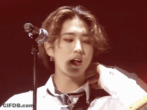 Young Man Singing Into Microphone GIF