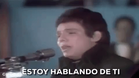 Young Man Singing Into Microphone GIF