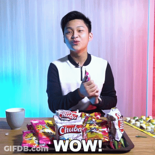 Young Man Sitting At Table With Chuba Snacks Saying Wow GIF