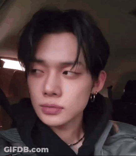 Young Man Sitting In Back Seat Of Car GIF