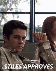 Young Man Sitting Next To Woman In Classroom Stiles Approves GIF