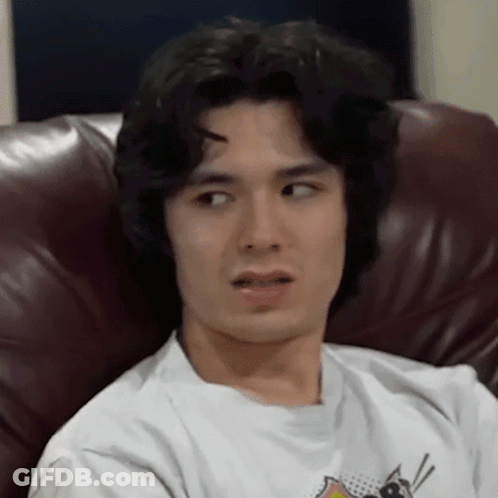 Young Man Sitting With Eyes Closed GIF