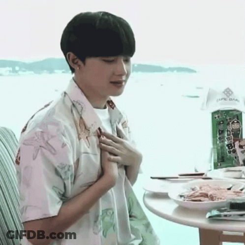 Young Man Sitting With Food GIF