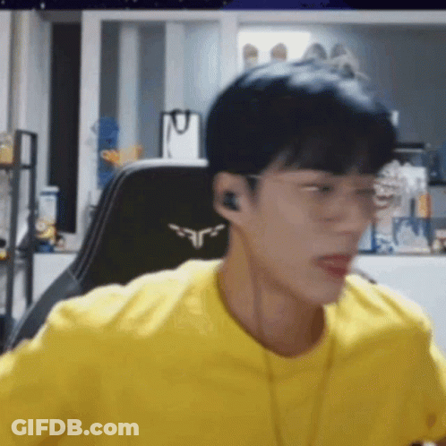 Young Man Sitting With Glasses And Headphones GIF