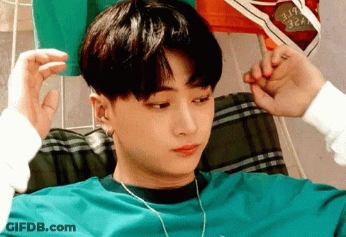 Young Man Sitting With Headphones And Paper GIF