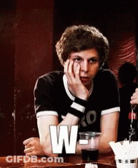 Young Man Sitting With Soda And W Letter GIF