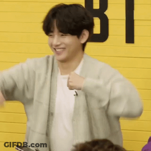 Young Man Smiling And Dancing GIF