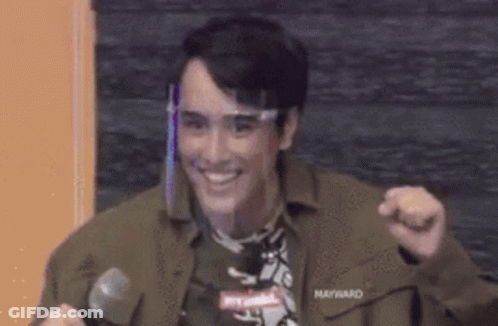 Young Man Smiling And Dancing GIF