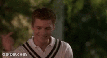 Young Man Smiling And Pointing GIF