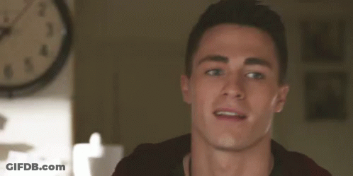 Young Man Smiling At Clock GIF