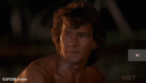 Young Man Smiling At Table GIF