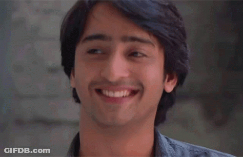 Young Man Smiling Eyes Closed GIF