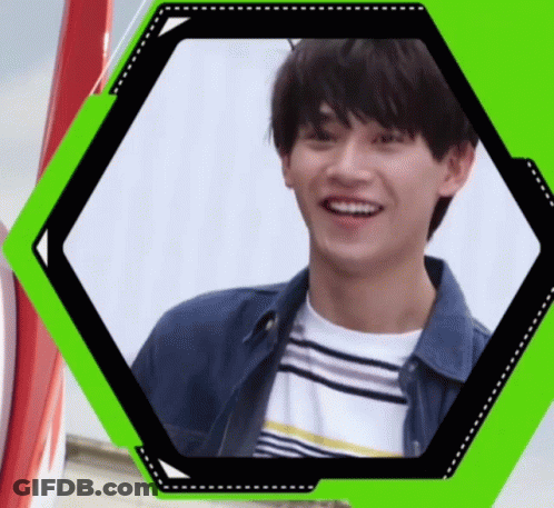 Young Man Smiling In Denim Jacket GIF