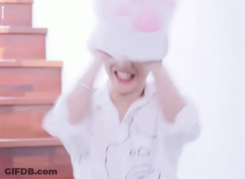 Young Man Smiling In Fish Shirt GIF