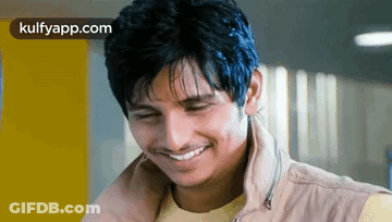 Young Man Smiling In Jacket GIF