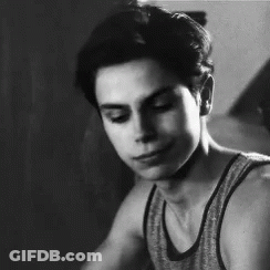 Young Man Smiling In Tank Top GIF