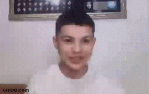 Young Man Smiling In White T-Shirt GIF