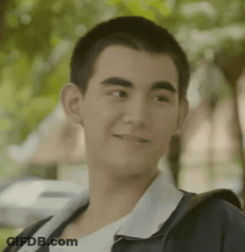 Young Man Smiling Wearing Backpack GIF