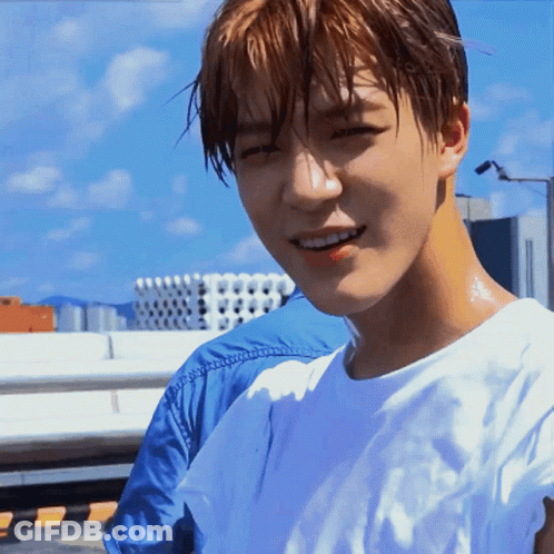 Young Man Smiling With Wet Hair GIF