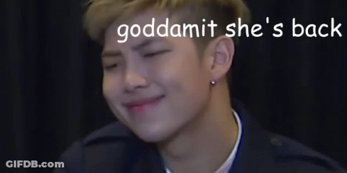 Young Man Smiling With Words Goddammit She's Back GIF