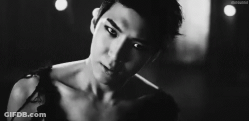 Young Man Smoking Cigarette GIF