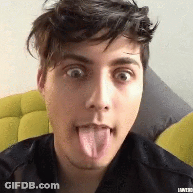 Young Man Sticking Tongue Out Making Funny Face GIF
