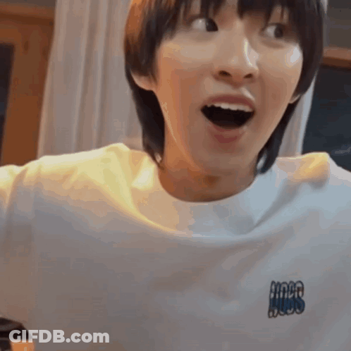 Young Man Surprised In White T-Shirt GIF