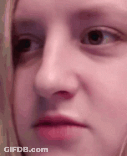 Young Man Taking Selfie In Bedroom GIF