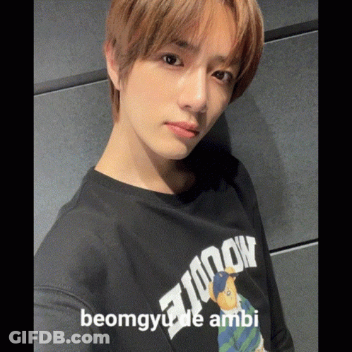 Young Man Taking Selfie In Tomorrow T-Shirt GIF