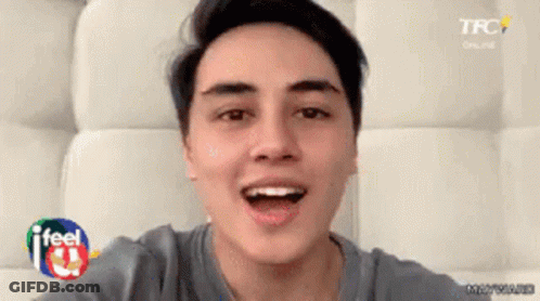 Young Man Taking Selfie With Mouth Open And TFC Logo GIF