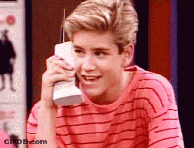 Young Man Talking On Cell Phone Smiling GIF