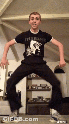 Young Man Wearing Black Shirt It S Dogs GIF